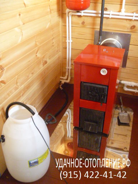 Установка чугунного твердотопливного котла КЧМ-Микро с разводкой системы отопления по дому и установкой алюминиевых радиаторов